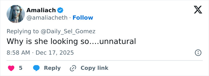 Tweet reply questioning Selena Gomez&rsquo;s appearance, mentioning a fan&rsquo;s inquiry about how she shaves her mustache.