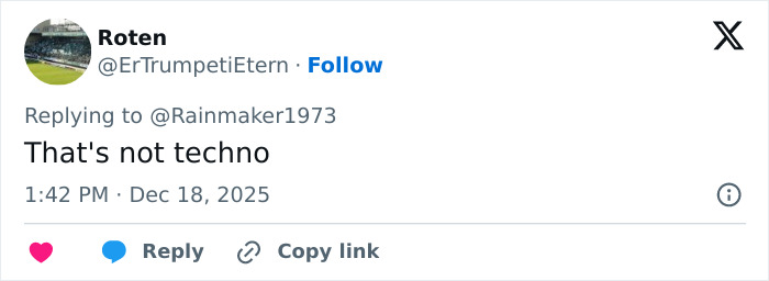 Screenshot of a tweet replying to @Rainmaker1973 saying That's not techno, timestamped Dec 18, 2025.