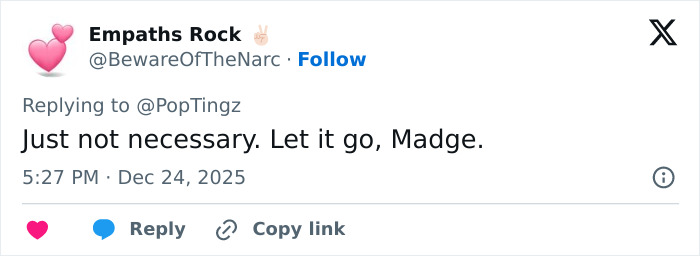 Twitter user replying with a comment about Madonna's holiday lingerie photoshoot and Photoshop controversy.