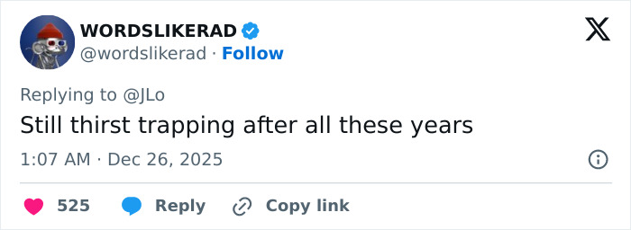 Jennifer Lopez Christmas photo showing a possible Photoshop odd detail causing people to question the editing skills.