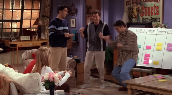 Friends playing a lively party game together in a cozy living room, enjoying the best party game experience.