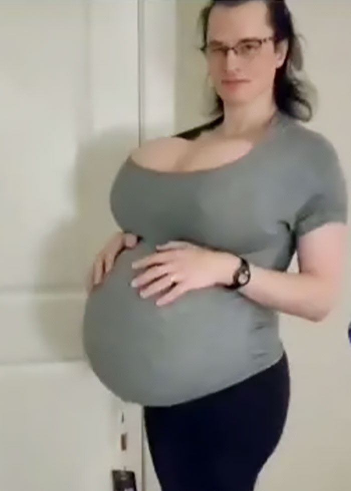 High school teacher in costume posing indoors, sparking outrage among parents after photos shared online.