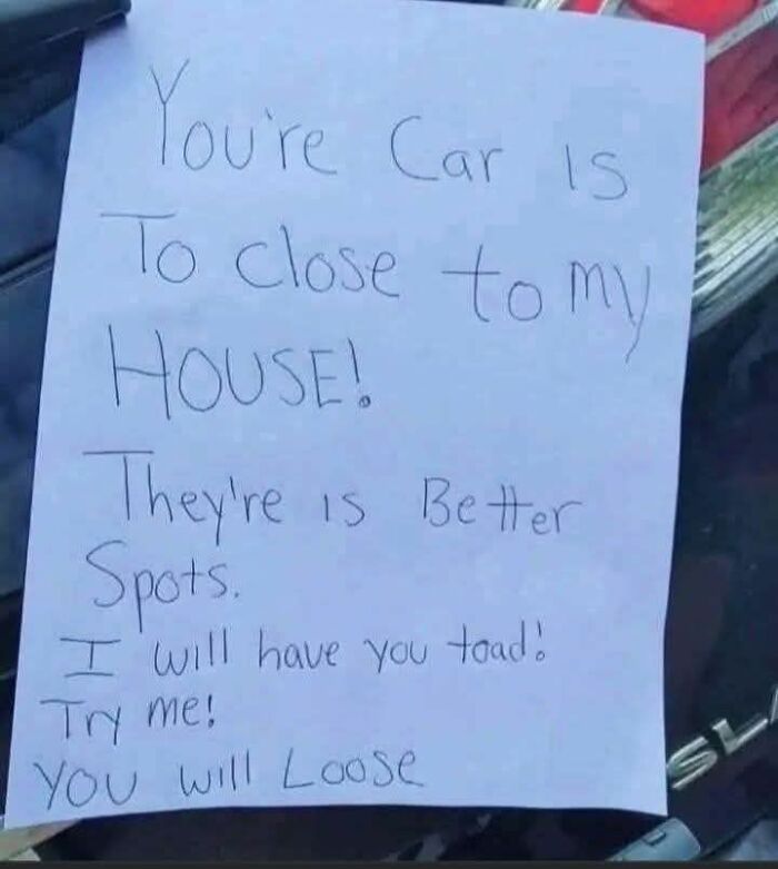 Handwritten funny meme note on a car saying "You're car is too close to my house" with humorous spelling errors.