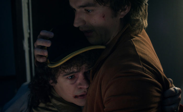 Two Stranger Things 5 characters in an emotional embrace, highlighting the show's comically bad penultimate episode reaction. Two Stranger Things 5 characters in an emotional embrace, highlighting the show's comically bad penultimate episode reaction.