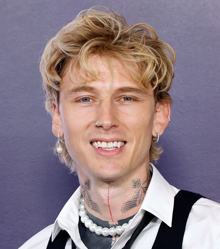 Young male star with blonde hair and tattoos, featured among the 50 most disliked stars of this year.