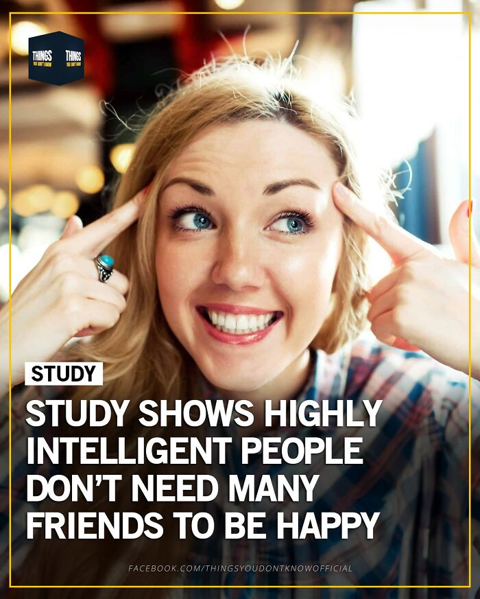 Smiling woman pointing to her head illustrating compelling facts and stories for great dinner party conversation starters.