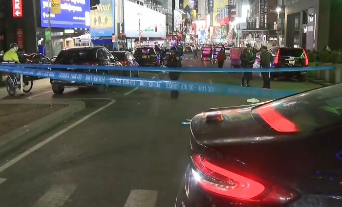 Police tape blocking a busy NYC street at night after Marvelous Mrs. Maisel actress lost her life while crossing the street.