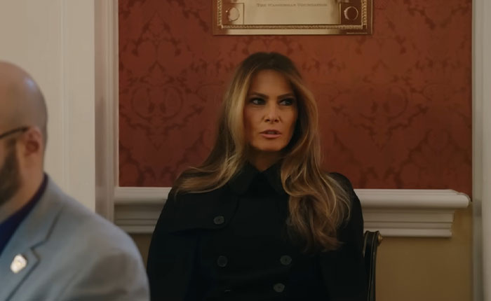 Melania Trump sitting in a formal room, wearing a black coat, in a scene from her new documentary. Melania Trump sitting in a formal room, wearing a black coat, in a scene from her new documentary.