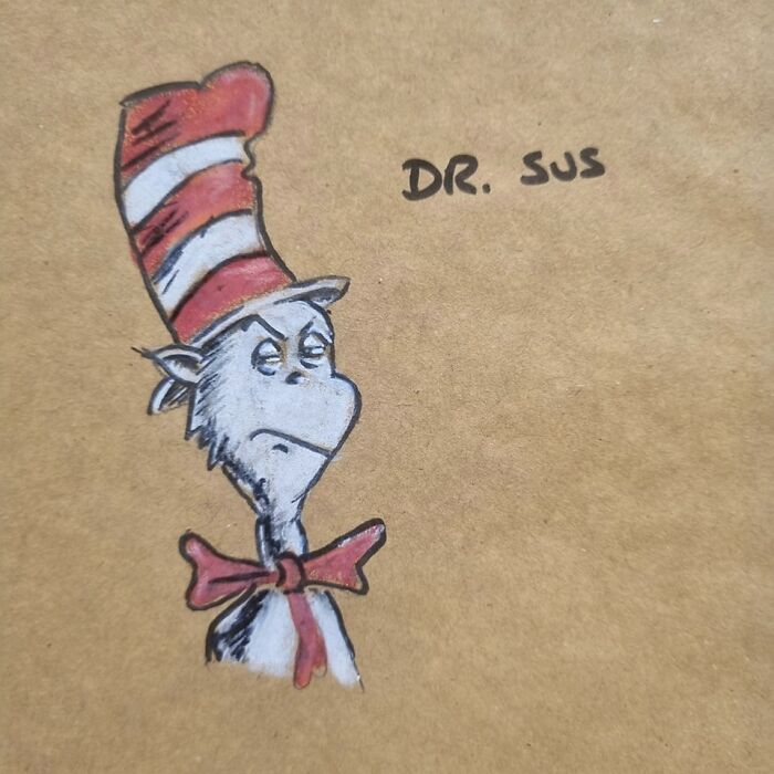 Hand-drawn dad joke pun of grumpy cat in red and white striped hat on a kids lunch bag.