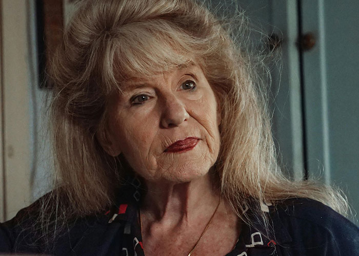 Elderly woman with light hair and a serious expression, illustrating shocking moments from unhinged MIL interactions.