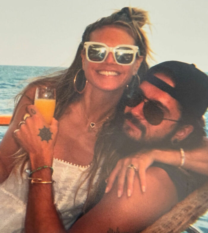 Heidi Klum and husband Tom Kaulitz enjoying a relaxing St. Barths getaway by the ocean with drinks.
