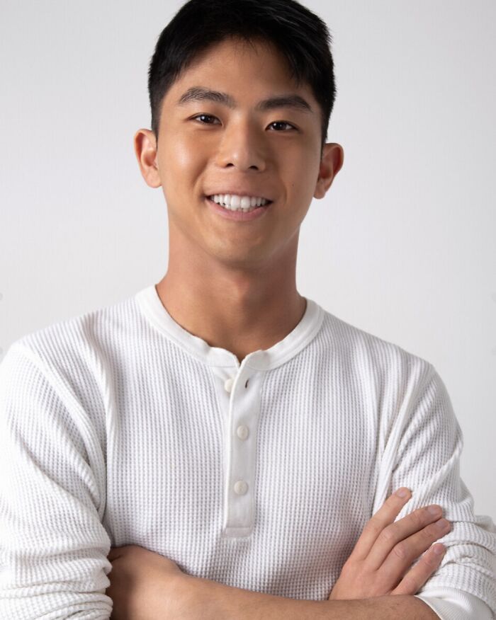 Young Asian man smiling confidently in a white shirt, representing website offering intimate encounters with Koreans and K-drama-style dates. Young Asian man smiling confidently in a white shirt, representing website offering intimate encounters with Koreans and K-drama-style dates.