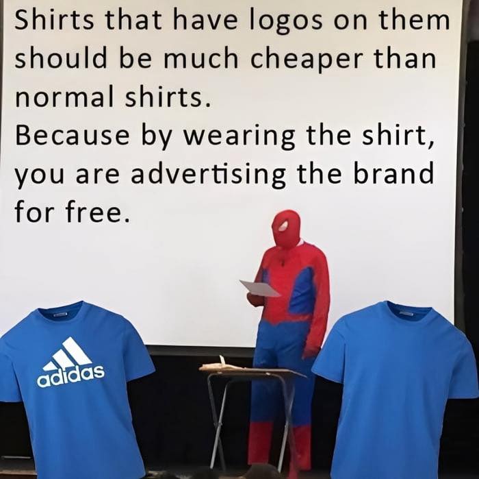 Person in a Spider-Man costume presenting a sarcastic post about branded shirts with logos and advertising humor.