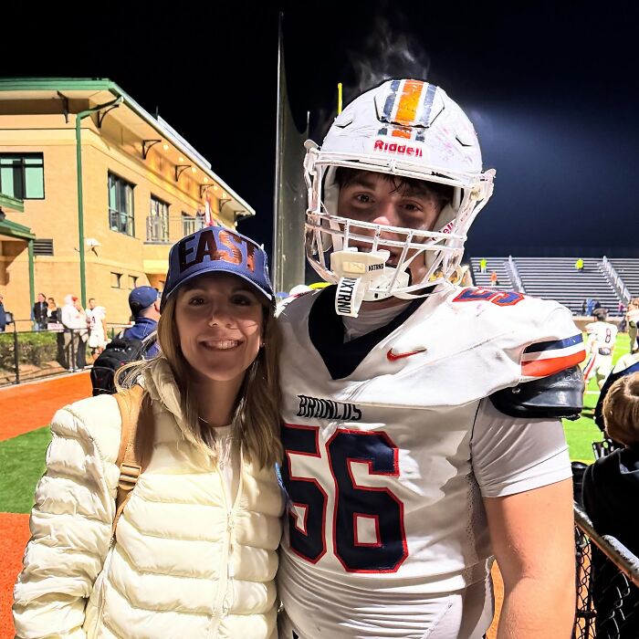 Mother-son photoshoot after football game, highlighting viral parenting debate over close family bond.