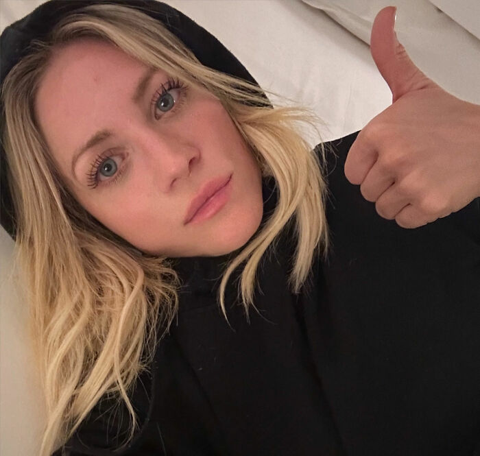 Britanny Snow giving a thumbs up while responding to plastic surgery rumors in a casual selfie. Britanny Snow giving a thumbs up while responding to plastic surgery rumors in a casual selfie.
