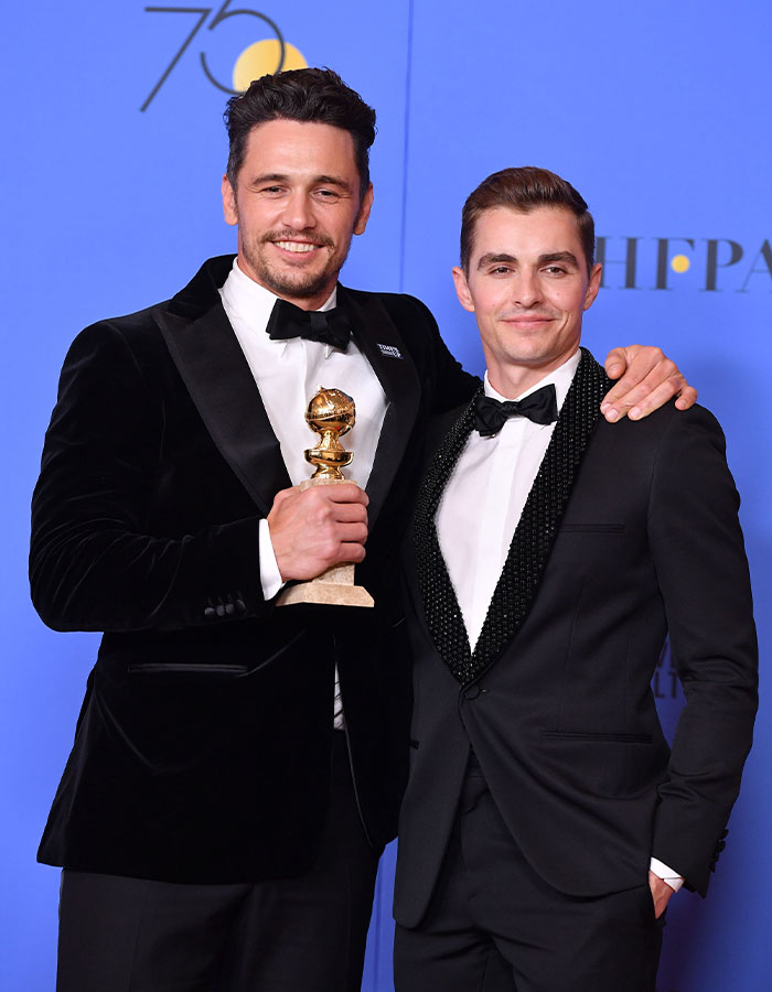 Two men in tuxedos at an awards event, one holding a trophy, representing James Franco and Hollywood insights. Two men in tuxedos at an awards event, one holding a trophy, representing James Franco and Hollywood insights.