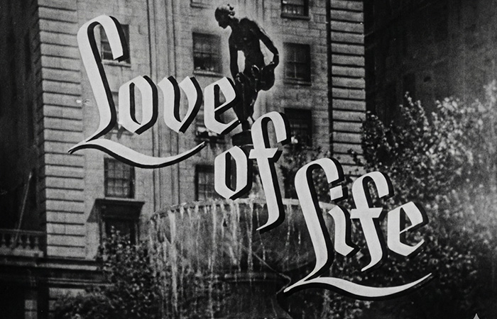 Title screen of Love of Life, one of the longest running TV shows, with a fountain and building in the background.