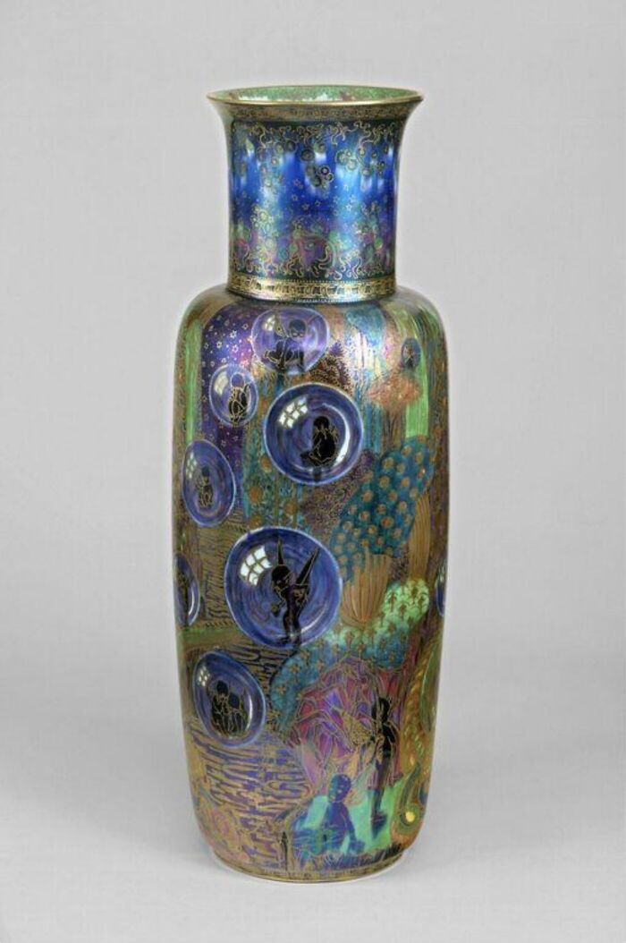 Ornate old vase with colorful patterns capturing culture and everyday life from the past in a powerful historic photo.