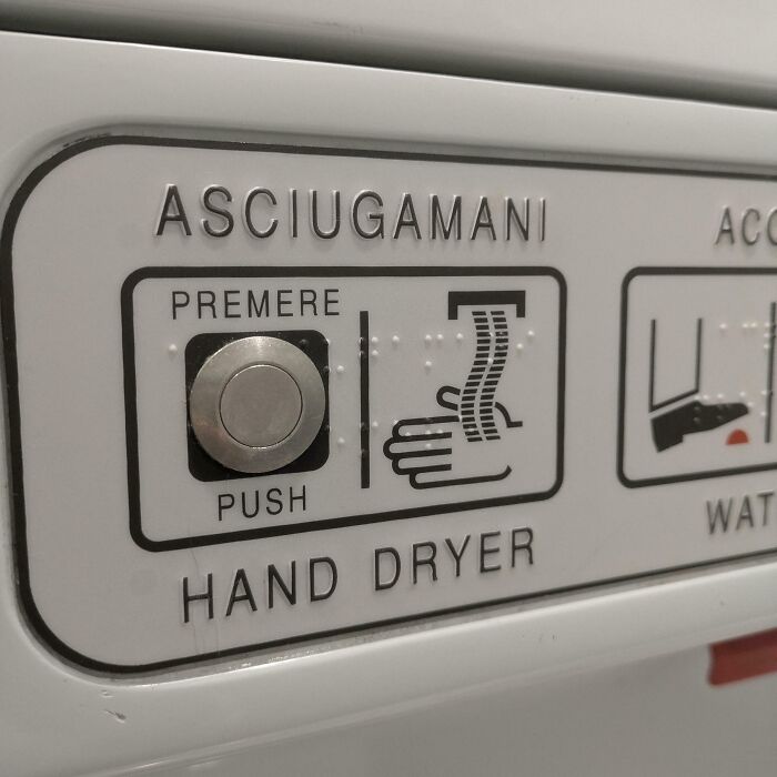 Hand dryer button with confusing design, an example of people doing their jobs poorly but impressively.