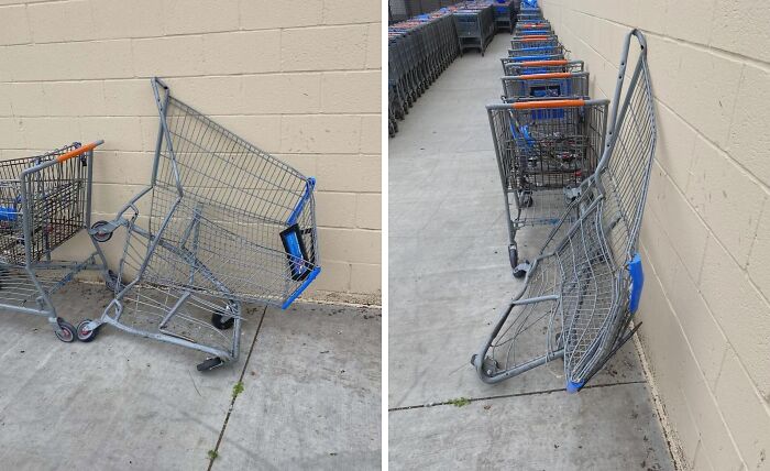 Bent and twisted shopping cart leaning against a wall, creating a confusing visual effect in an outdoor store area.