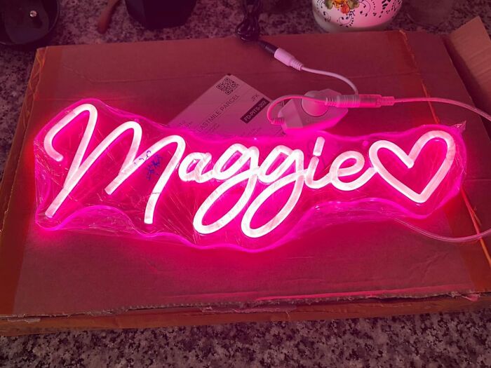 Personalized neon name sign with heart design, a custom gift idea for Christmas ready in time for holiday giving.