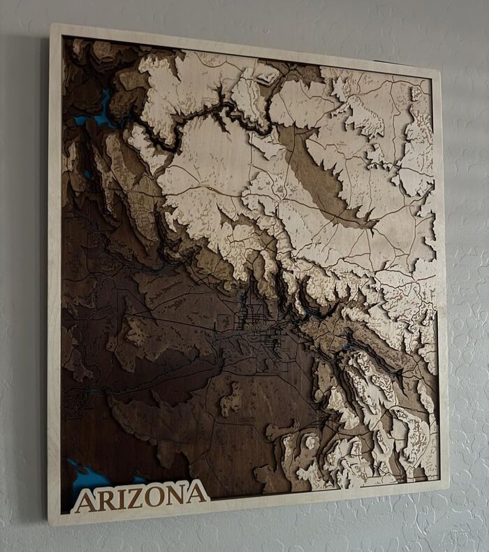 Wooden custom gifts featuring a layered topographic map of Arizona, perfect for personalized Christmas presents.
