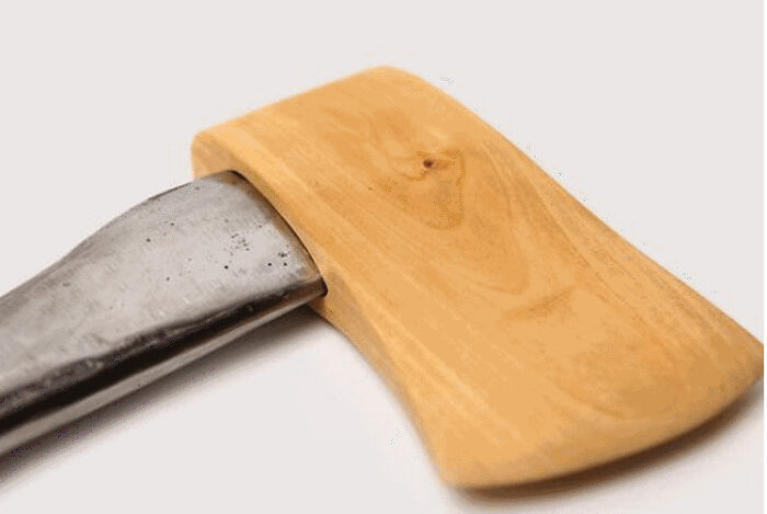 Wooden object attached to a metal tool, an example of pointless things that serve no purpose except for being funny.