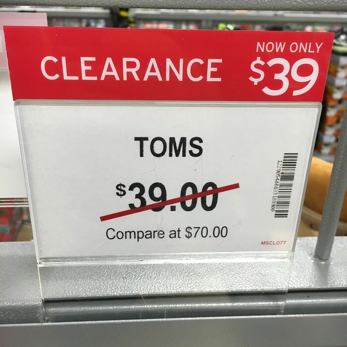 Clearance sign showing a pointless pricing mistake with crossed-out price and same sale price, highlighting funny pointless things.