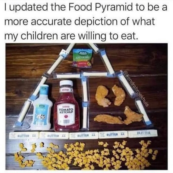 Updated food pyramid made of condiments, chicken nuggets, and crackers showing relatable memes for parents about kids' eating habits.