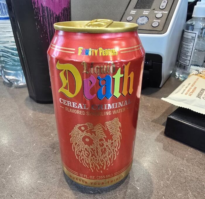 Red can of Liquid Death Fruity Pebbles flavored sparkling water on a countertop, a popular gag gift idea.