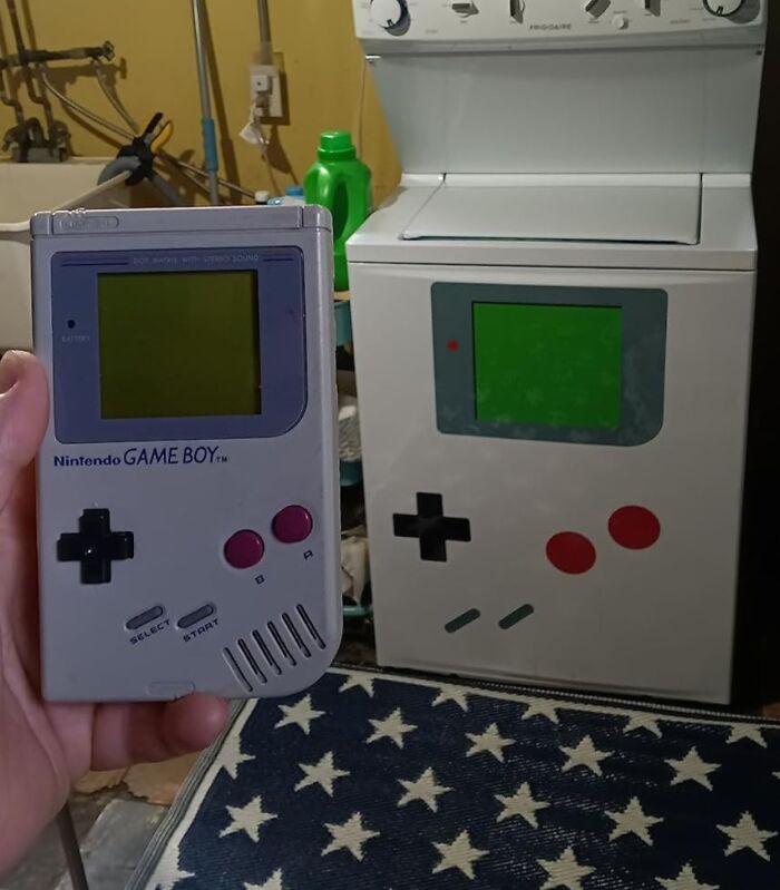 Vintage Nintendo Game Boy held next to a washing machine decorated to look like a Game Boy toy gag gift idea.