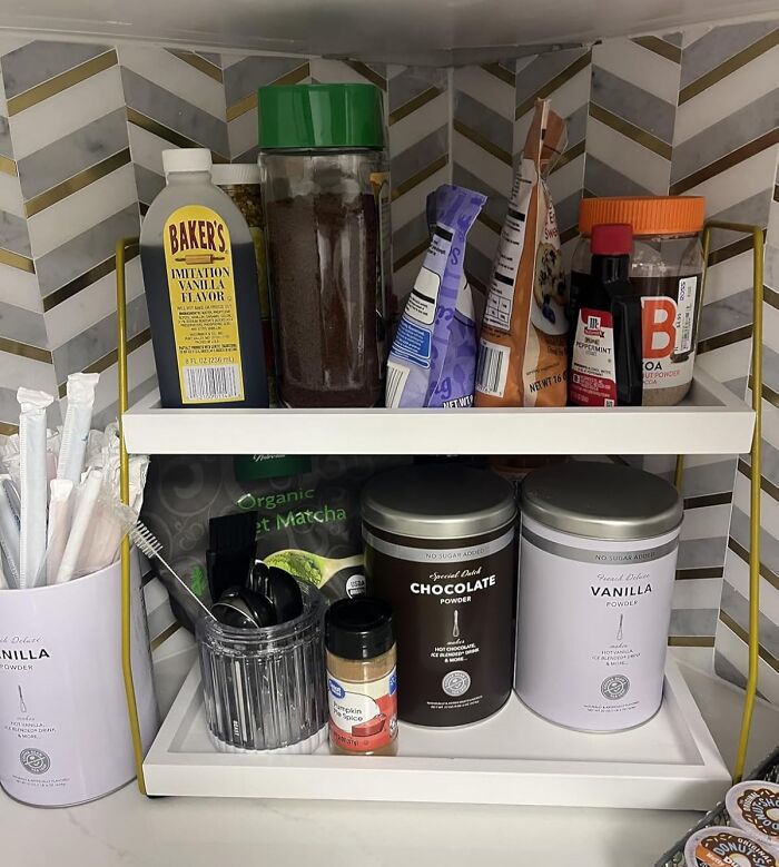 Spice rack with vanilla powder, chocolate powder, coffee, and baking ingredients for gifts to impress mother-in-law.