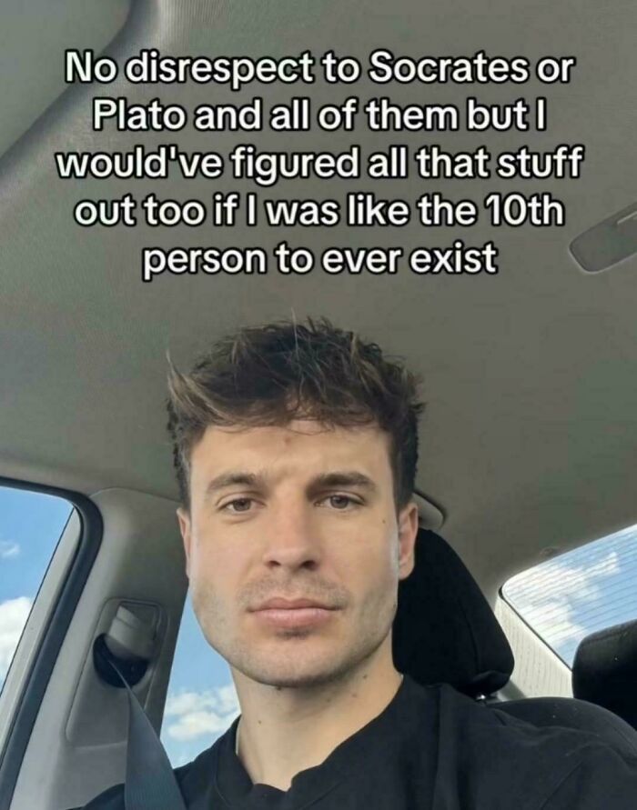 Young man in a car with a thoughtful expression, sharing a humorous take on intellectual philosophy memes.