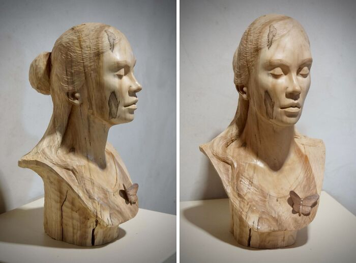 Woodworker carved a detailed wooden bust of a woman with a butterfly accent, showcasing incredible woodworking craftsmanship.