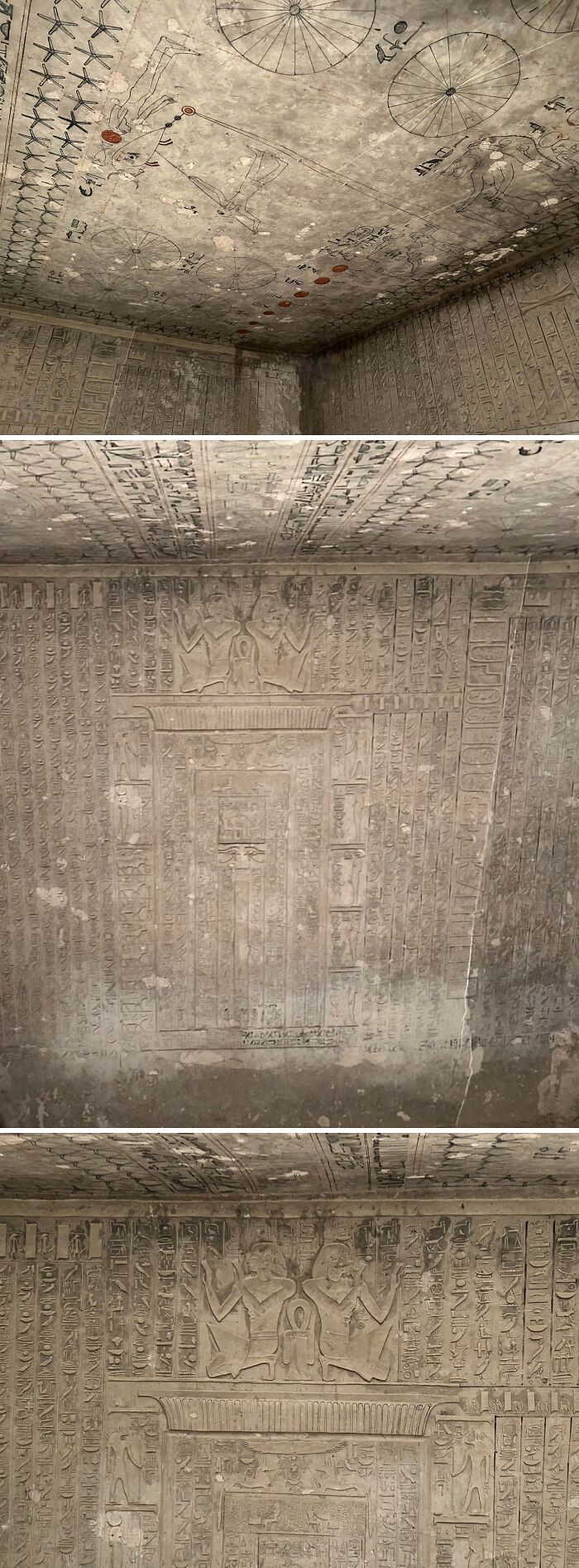 Ancient Egypt hieroglyphs carved on tomb walls and ceiling depicting celestial and religious scenes.