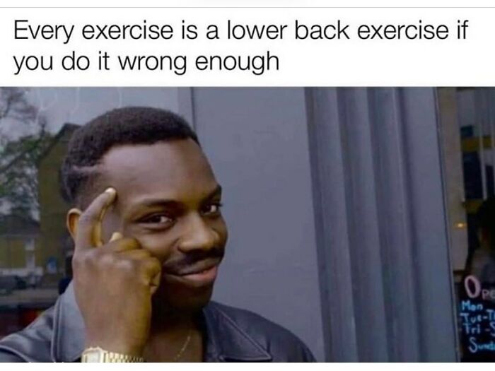 Man smiling and pointing to his temple with text about exercises causing lower back pain in gym memes for lifters.