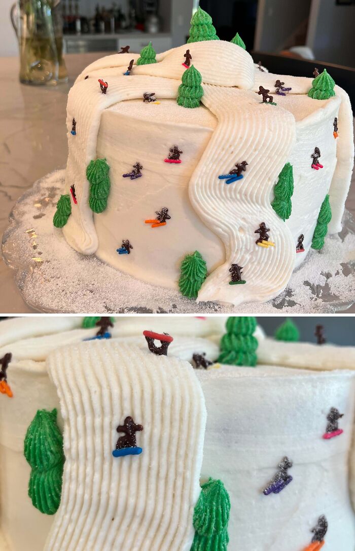 Ski slope cake with detailed frosting trees and miniature skier decorations showcasing masterfully crafted cakes creativity.