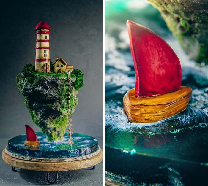 Masterfully crafted cake featuring a floating island with a lighthouse and a red-sailed wooden boat on blue water.