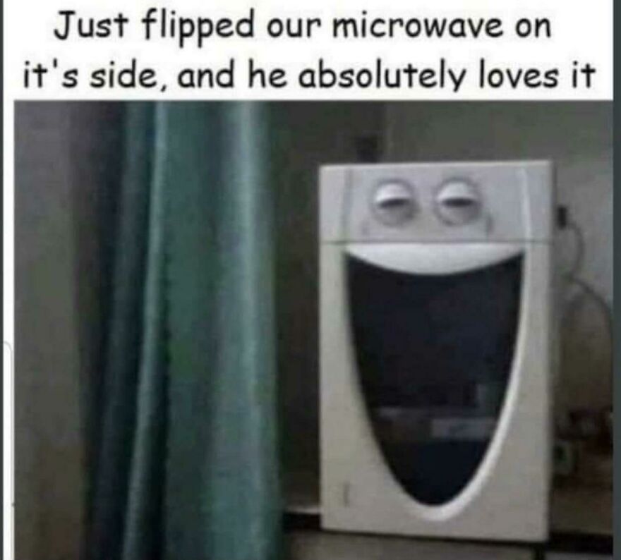 Microwave flipped on its side with eyes and mouth drawn, showing a funny horrible joke rewarded with an angry upvote.