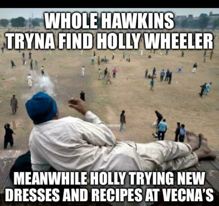 Man lying down watching group of people playing on field, funny Stranger Things meme about character Holly Wheeler.