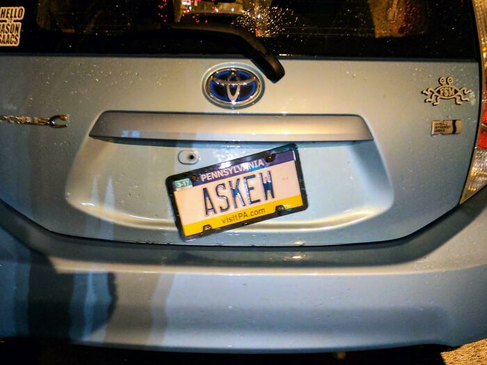 Personalized license plate ASKEW on a silver Toyota causing strangers to do double takes at night in Pennsylvania.