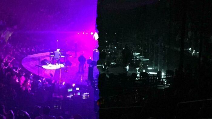 Concert photo captured at the perfect time showing a vibrant purple stage light contrasting with a dark empty side view.