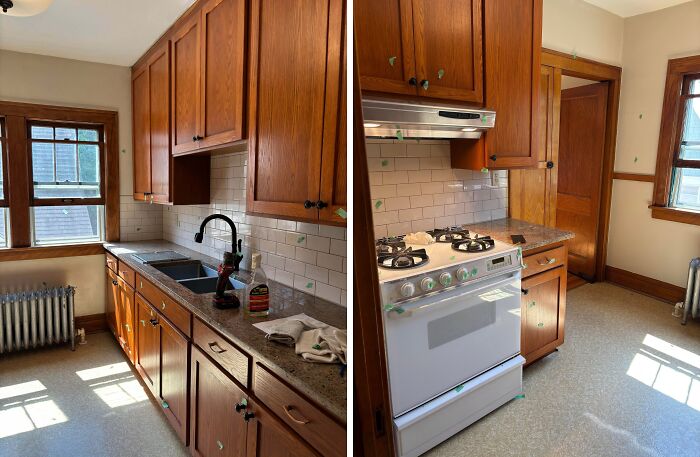 Old kitchen with wooden cabinets and outdated appliances in a rental showing common landlord corner-cutting issues.