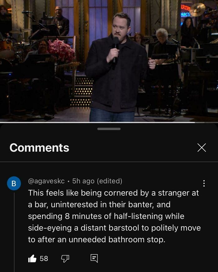 Comedian performing on stage delivering epic burns of 2025 with sharp insults turning humor into art.