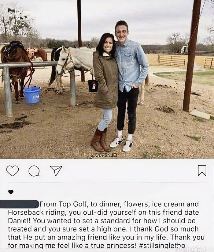 Couple posing awkwardly near horses with one person’s pants wet, capturing a funny and awkward attempt moment.
