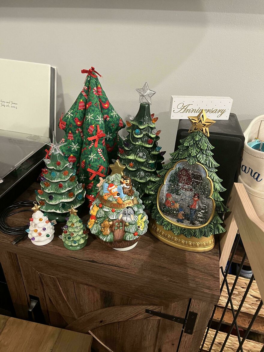 Collection of nostalgic vintage Christmas decorations featuring various decorated Christmas trees and holiday themes.