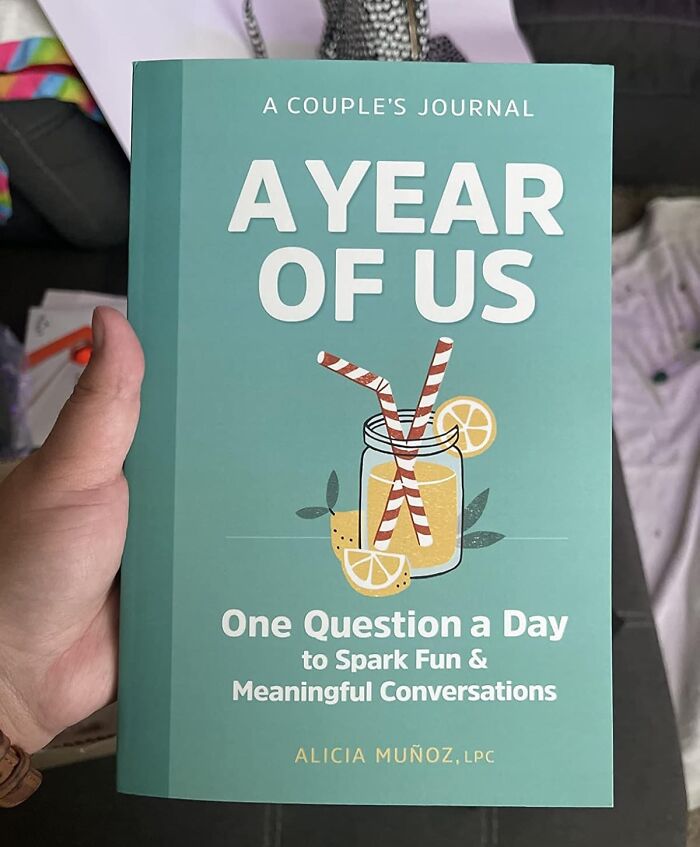 A Copy Of A Year Of Us: A Couple's Journal Is A Papery Time Capsule That Will Allow You To Look Back On All The Beautiful And Chaotic Moments Of Your Relationship, And Wonder How You're Still Together