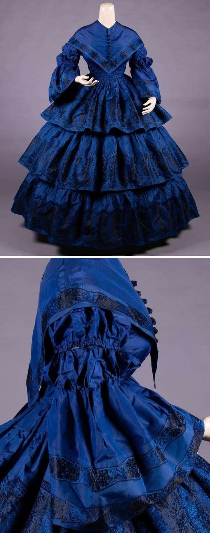 Victorian blue silk dress with black trim, showcasing culture and everyday life in the past through powerful old photos.