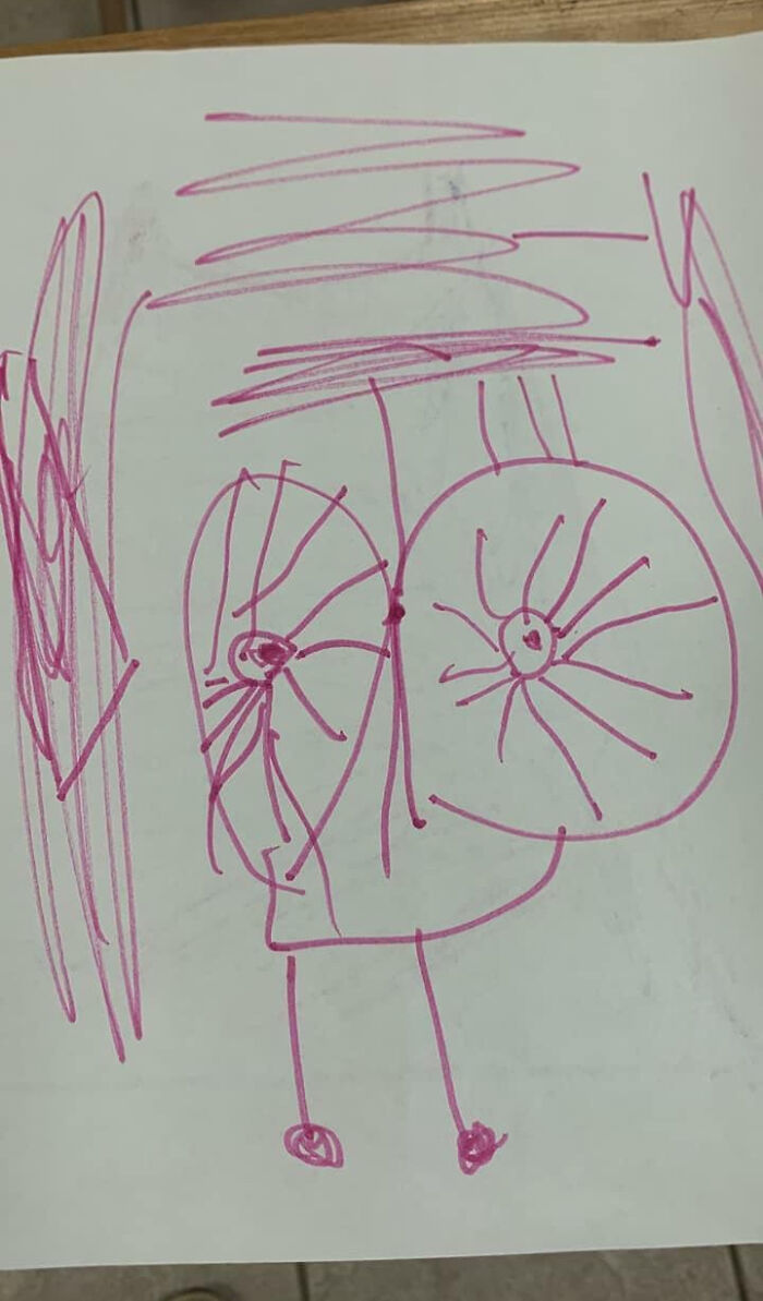 Child's funny drawing of a bike with no filter, showcasing a very flattering portrait style in purple marker.