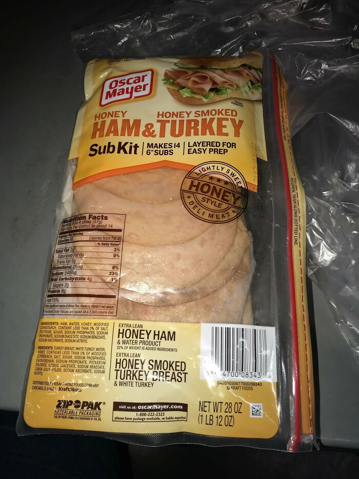 Oscar Mayer honey ham and honey smoked turkey sub kit packaging with nutrition facts and resealable bag on table.